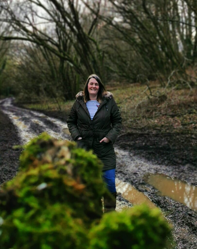 Parka coat paired with a Joules Breton top