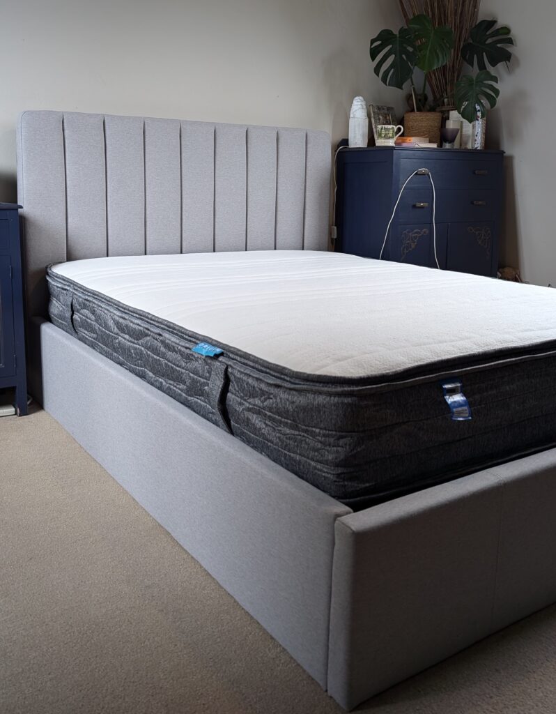 Origin Hybrid Mattress and Origin Storage Bed the picture shows a new mattress and bed in a bedroom